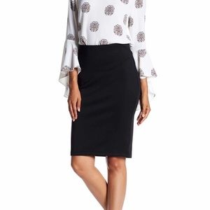 Black scuba pencil skirt with gold zipper back